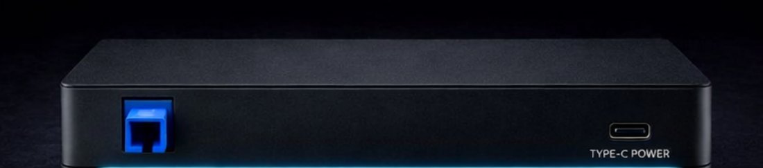 ACS FiberBox X1 from the left side, showing the SC optical port and USB Type-C power input